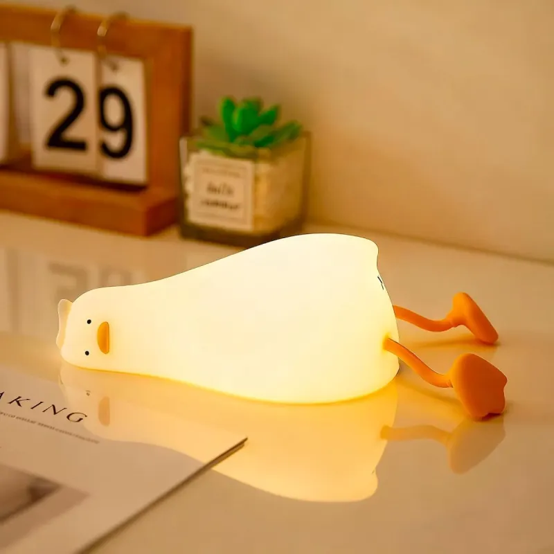 Lámpara de pato tumbado: luz nocturna con humor