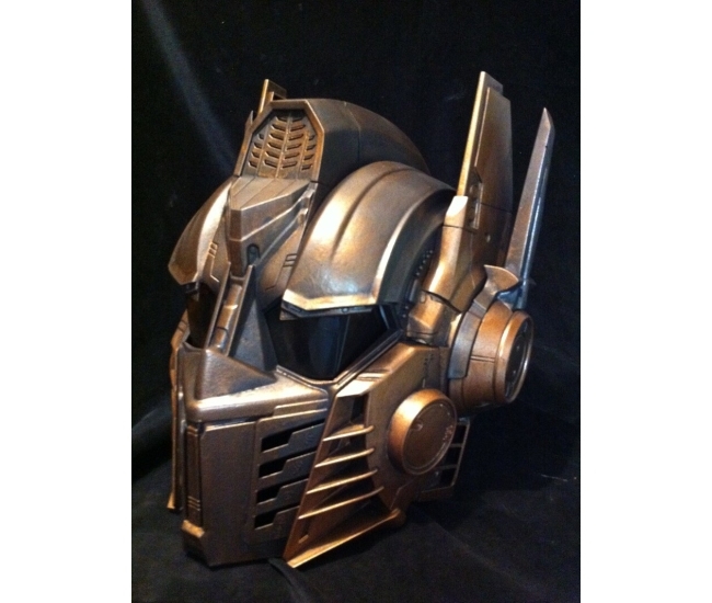 Casco de cobre y bronce Optimus Prime Transformers tamaño real Cosplay dañado en batalla